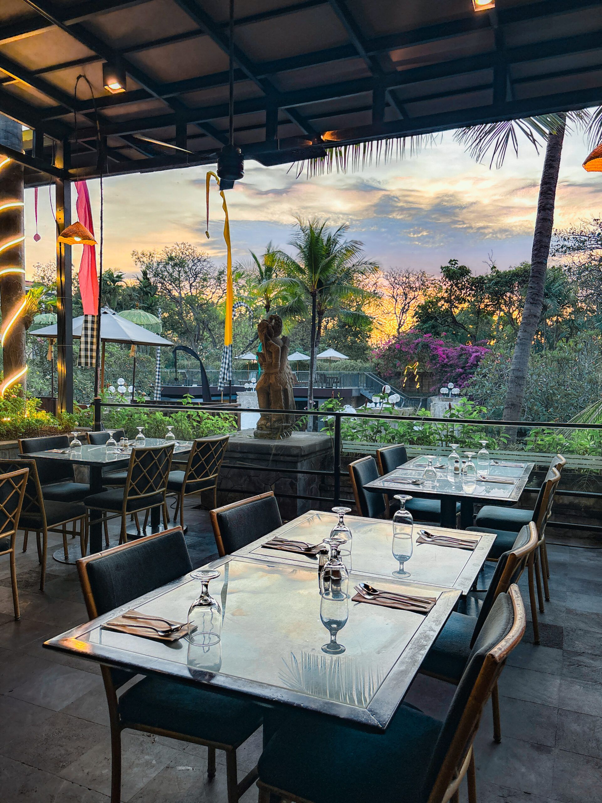 Kuta Paradiso — outdoor restaurant terrace at sunset