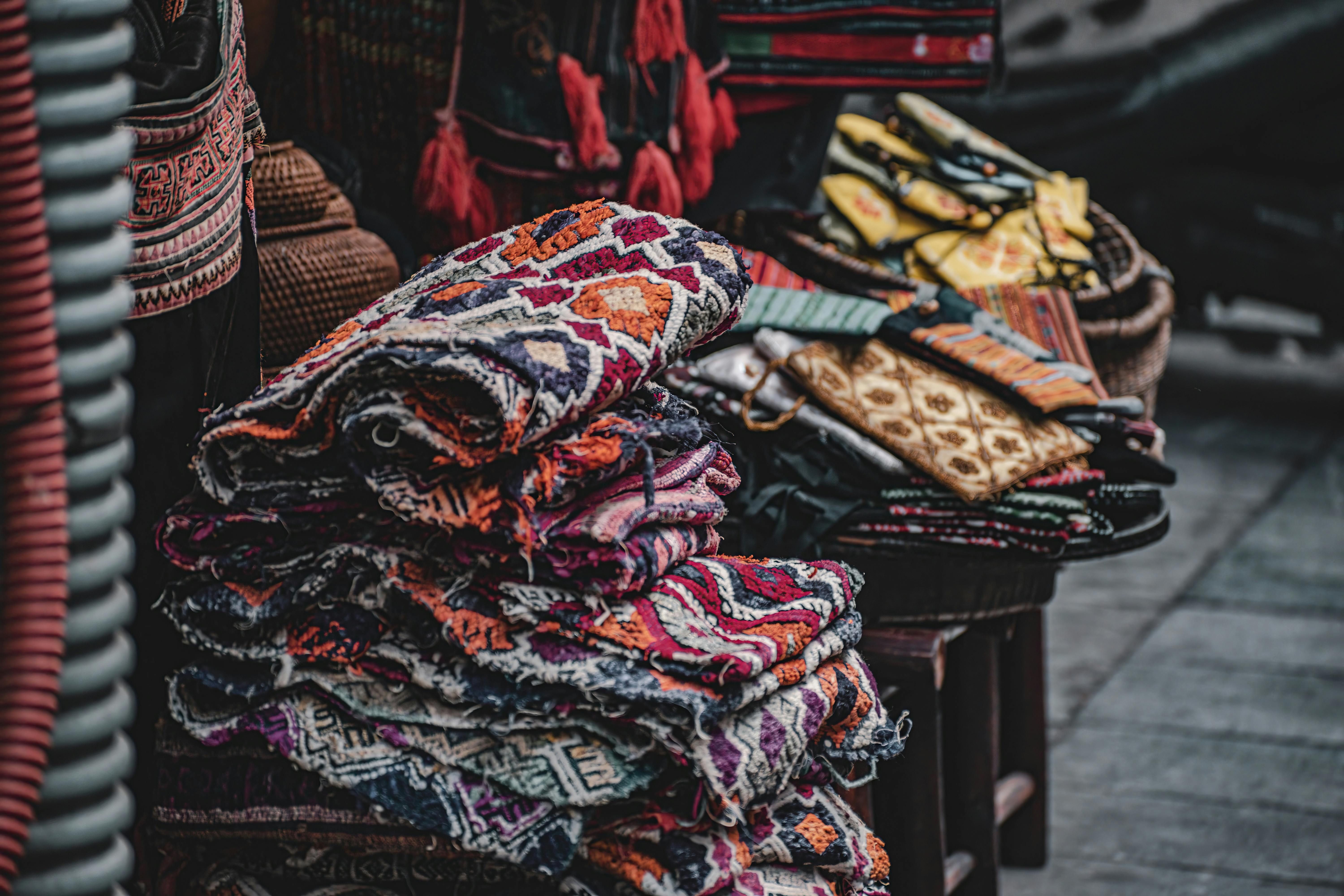 Bali — Colorful handwoven textiles on display at a Hanoi market stall, showcasing vibrant designs and cultural heritage.