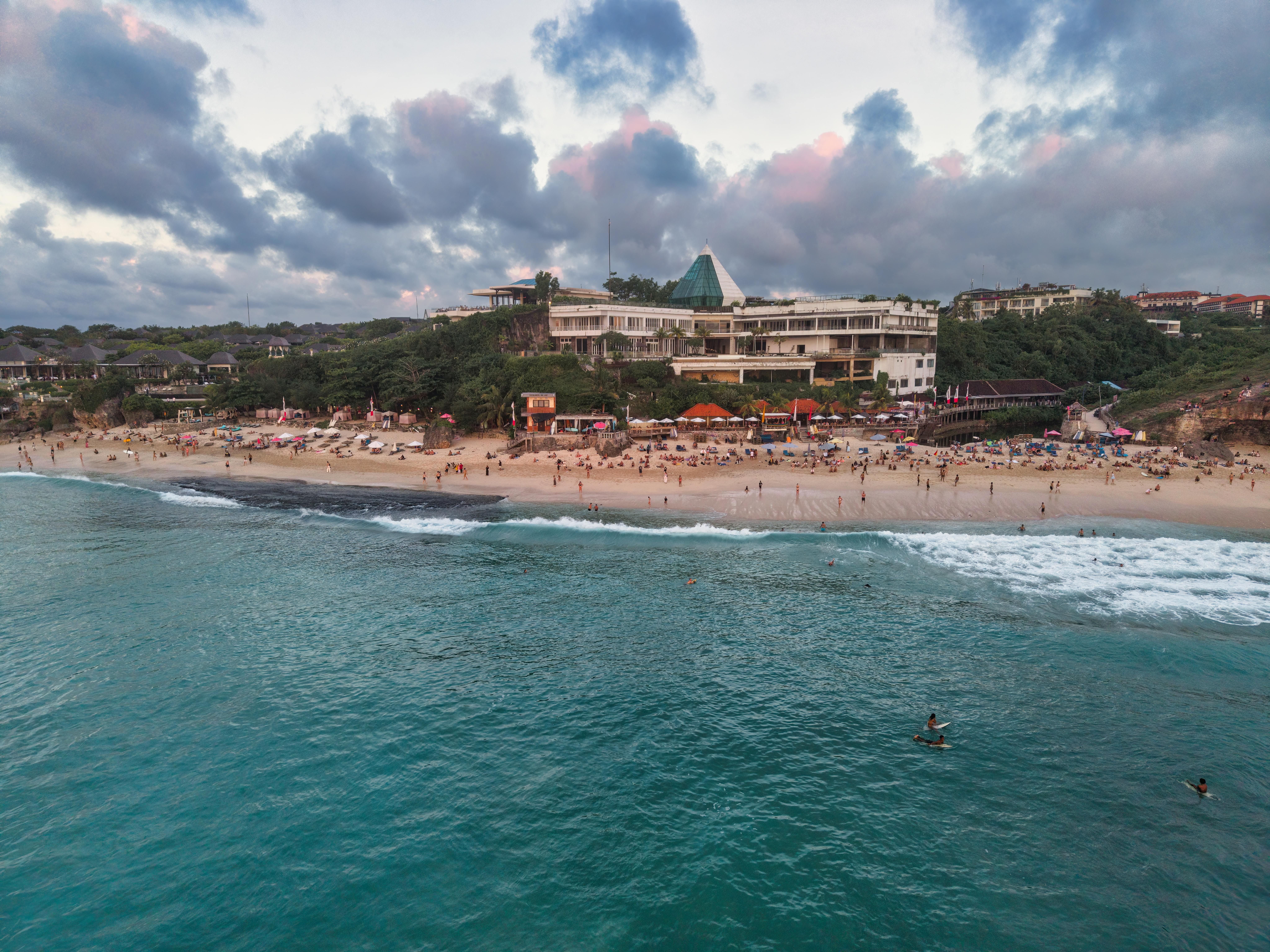 Bali — Scenic aerial view of a beachfront resort in Bali, Indonesia at sunset.