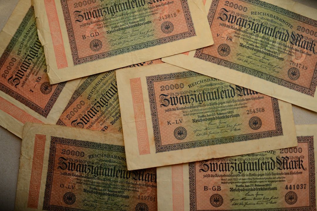 Cambodian riel banknotes and US dollars