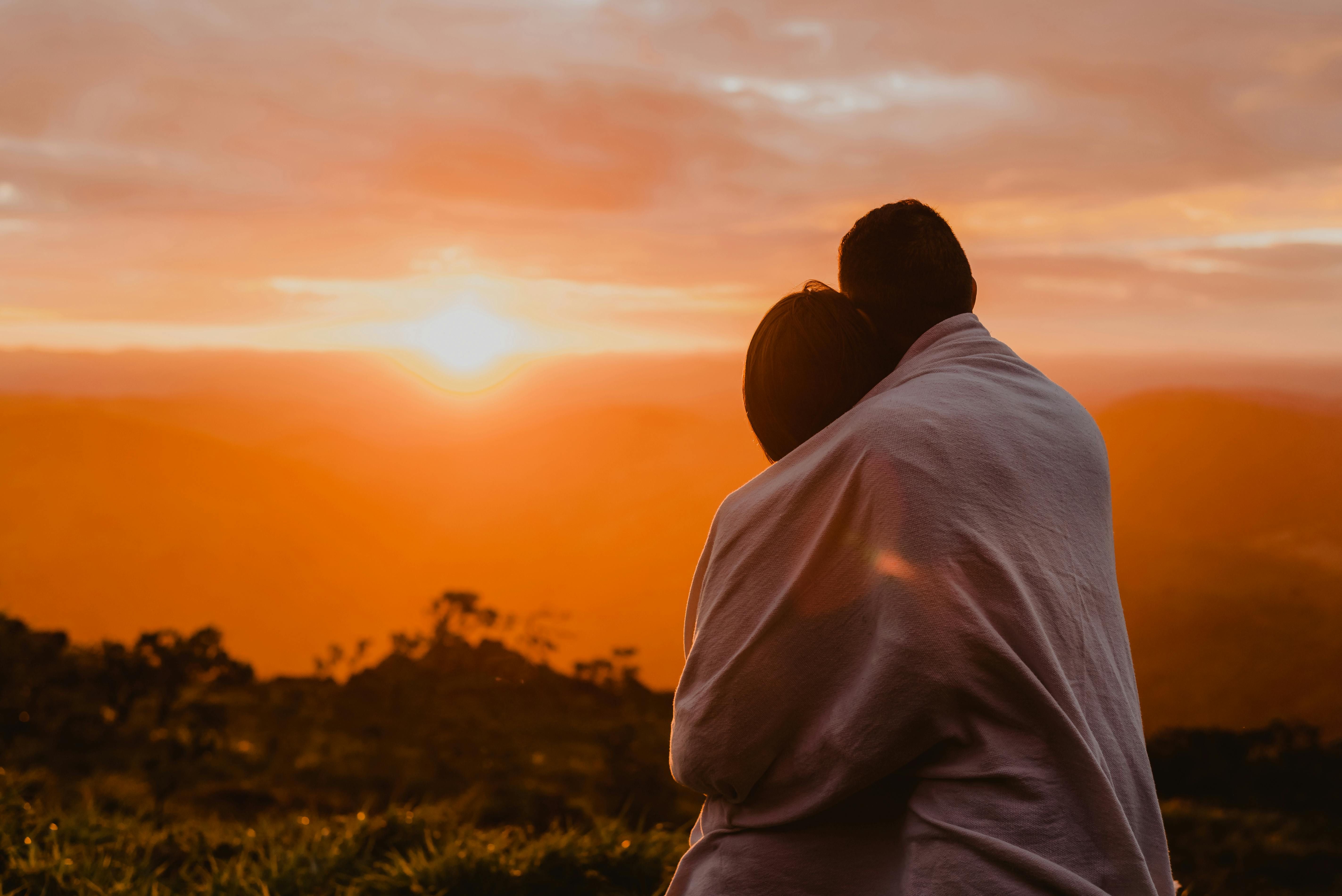 couple watching sunrise Mount Batur Bali - bali - inline