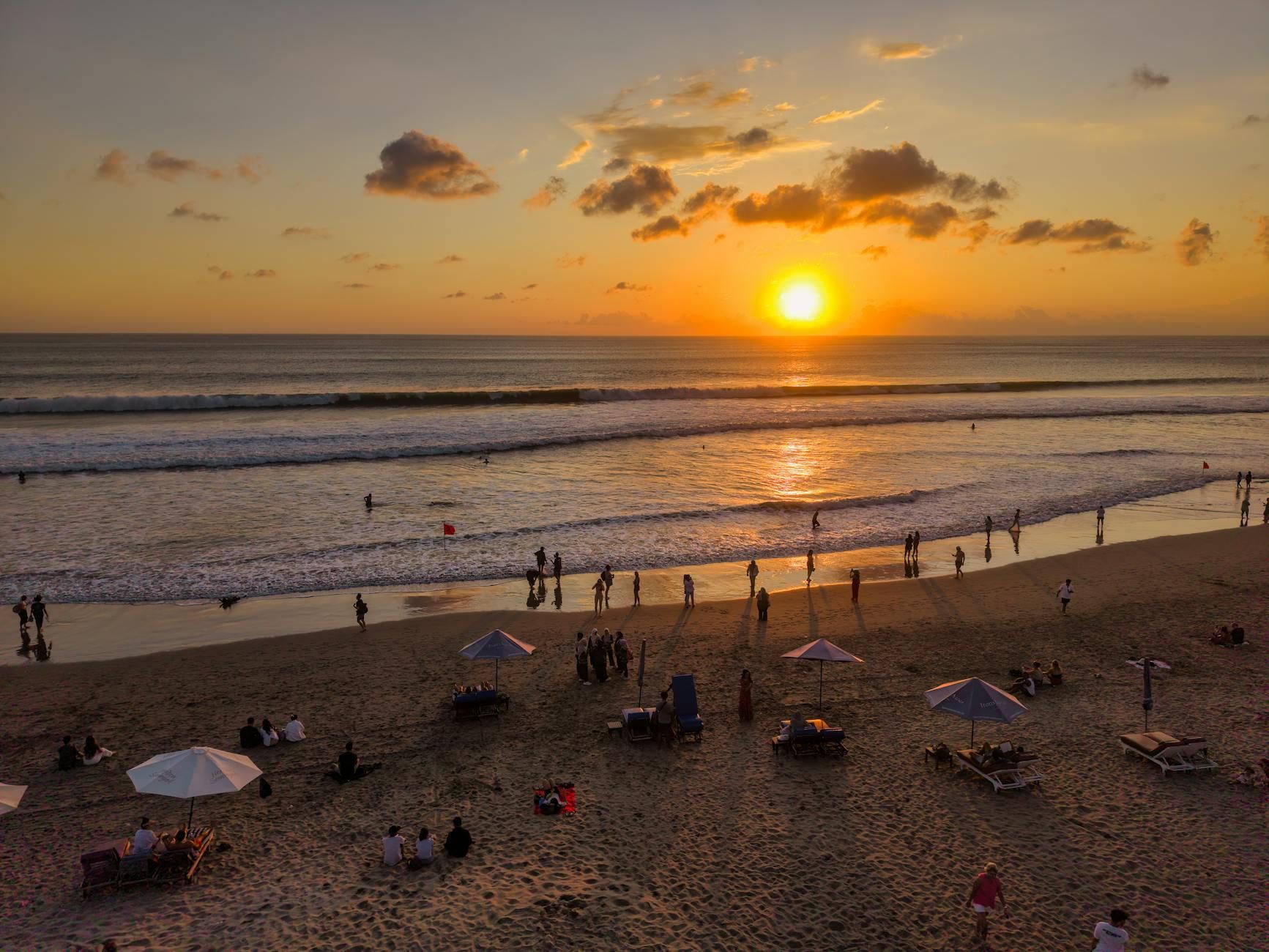 Kuta beach sunset crowds Bali surfers