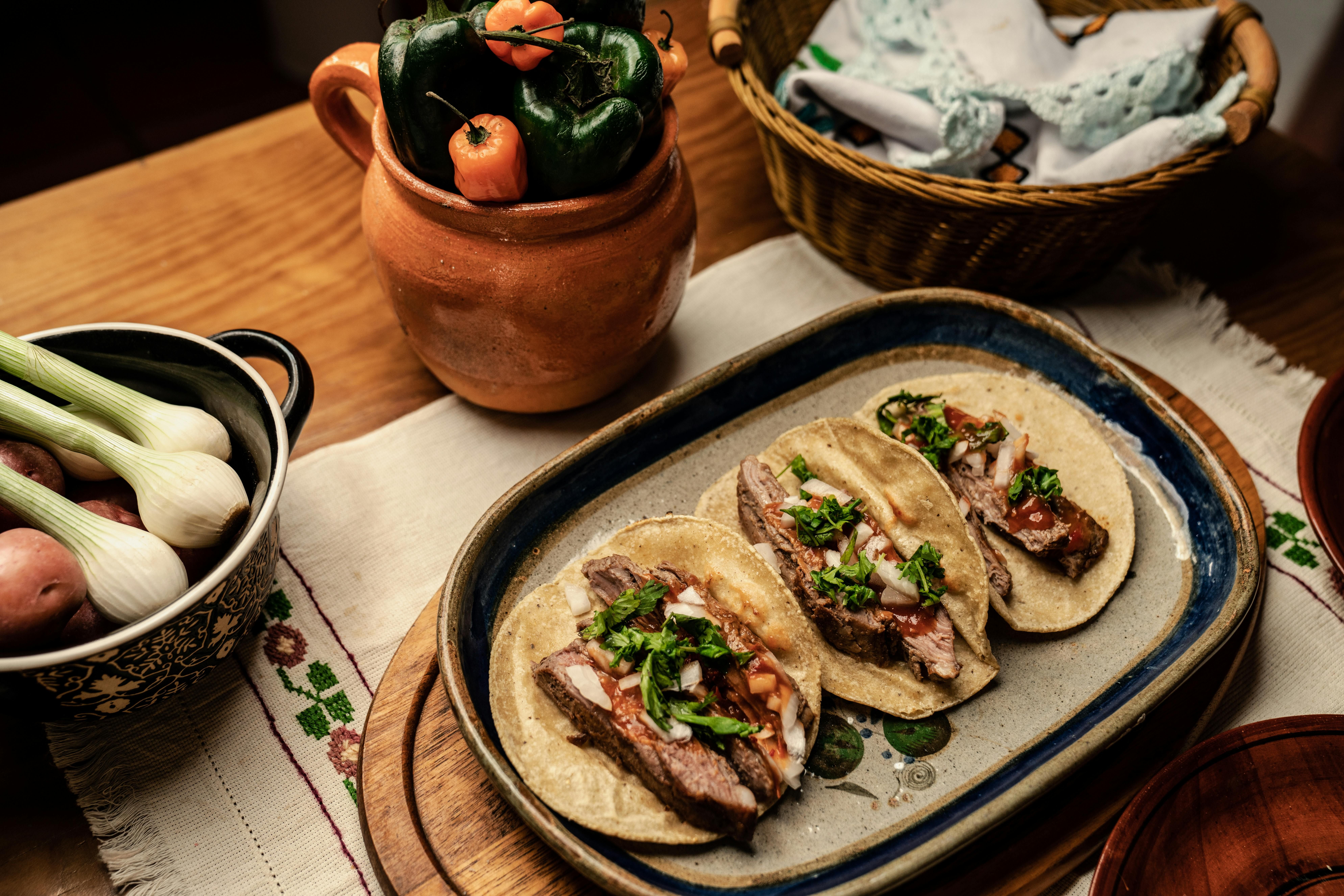 Mexico — Delicious Mexican tacos served with fresh ingredients, highlighting vibrant flavors and traditional presentation.
