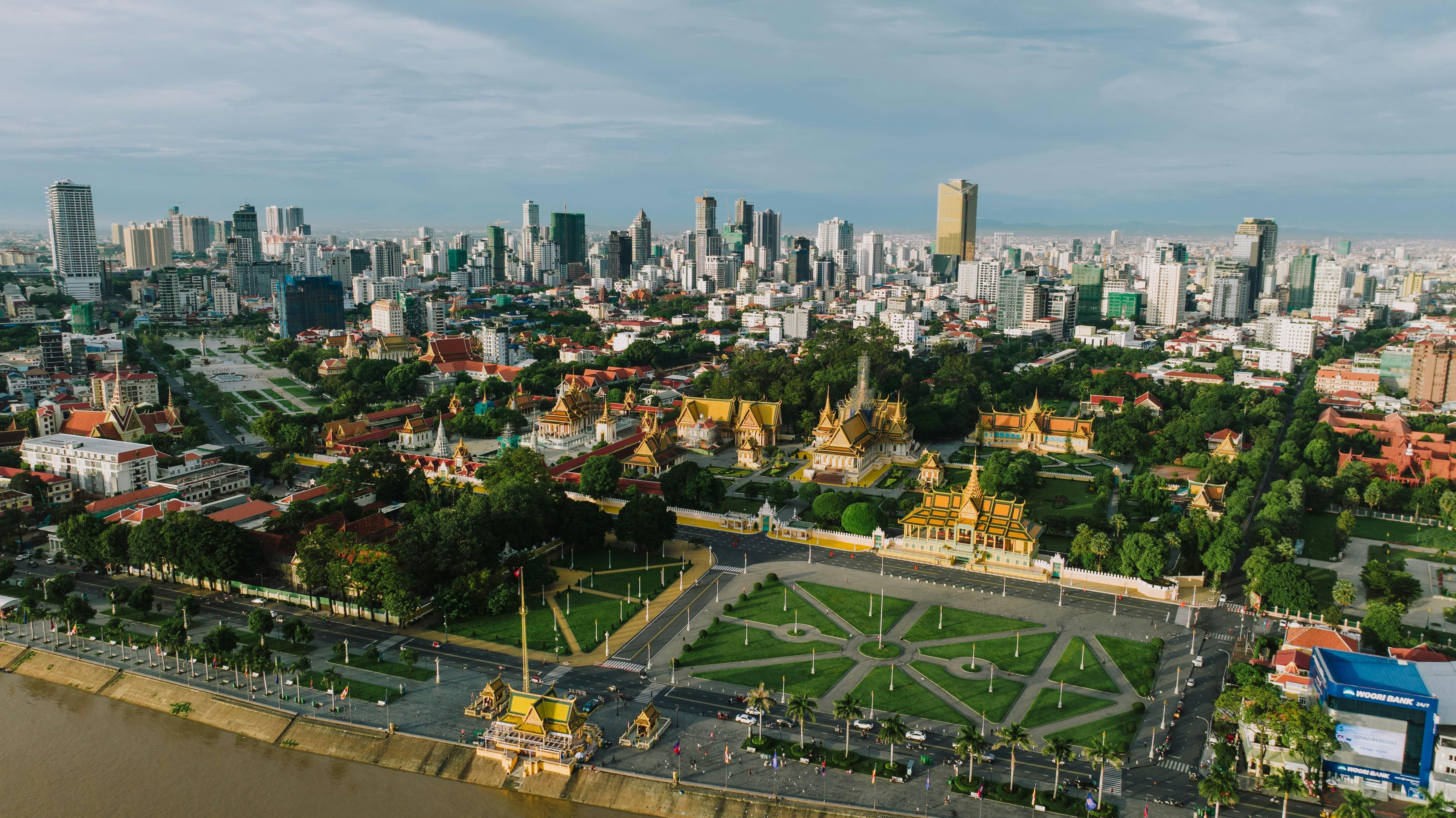 Phnom Penh — Stunning aerial view of Phnom Penh cityscape highlighting the Royal Palace and modern skyline.