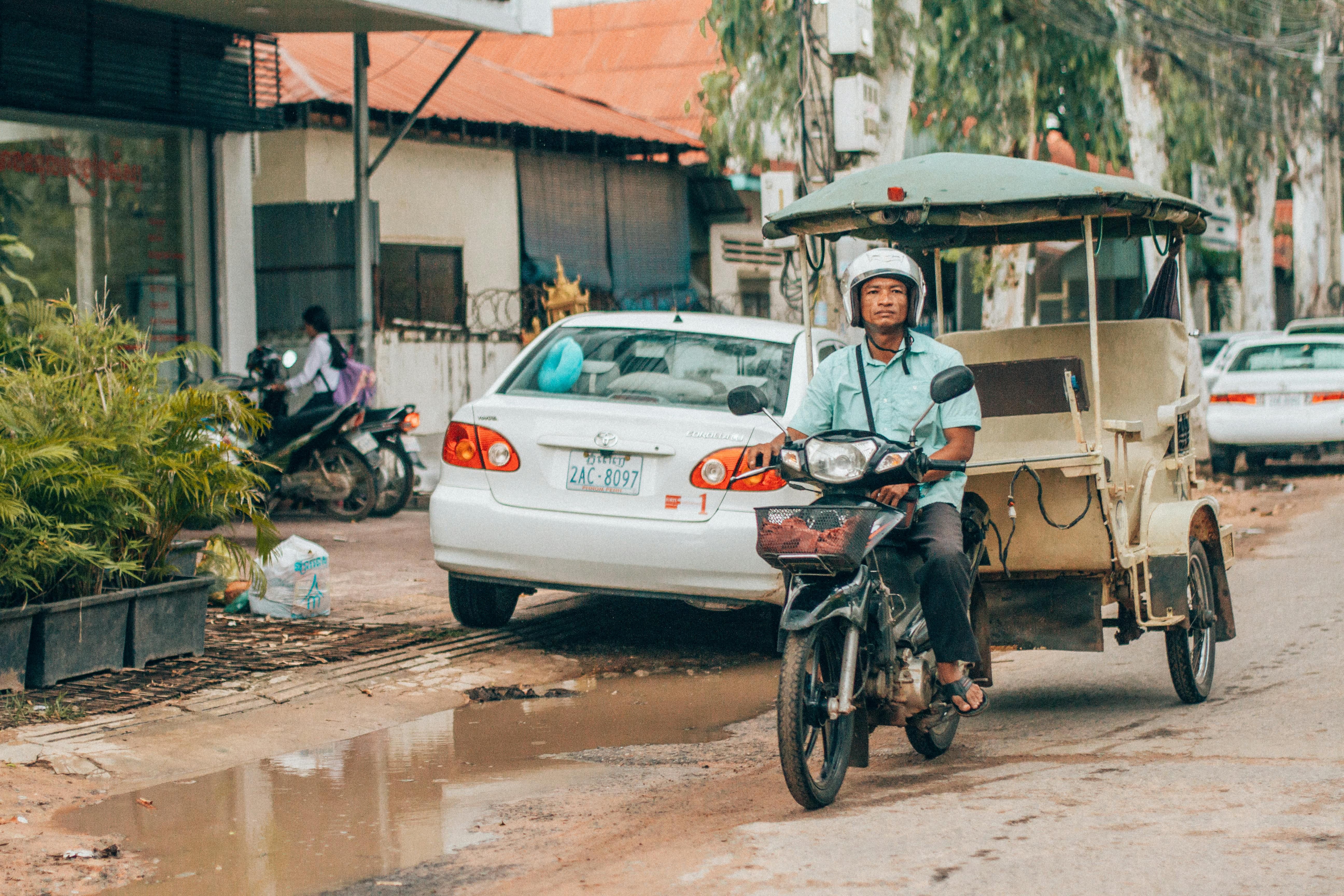 tuk-tuk siem reap street scene, Cambodia