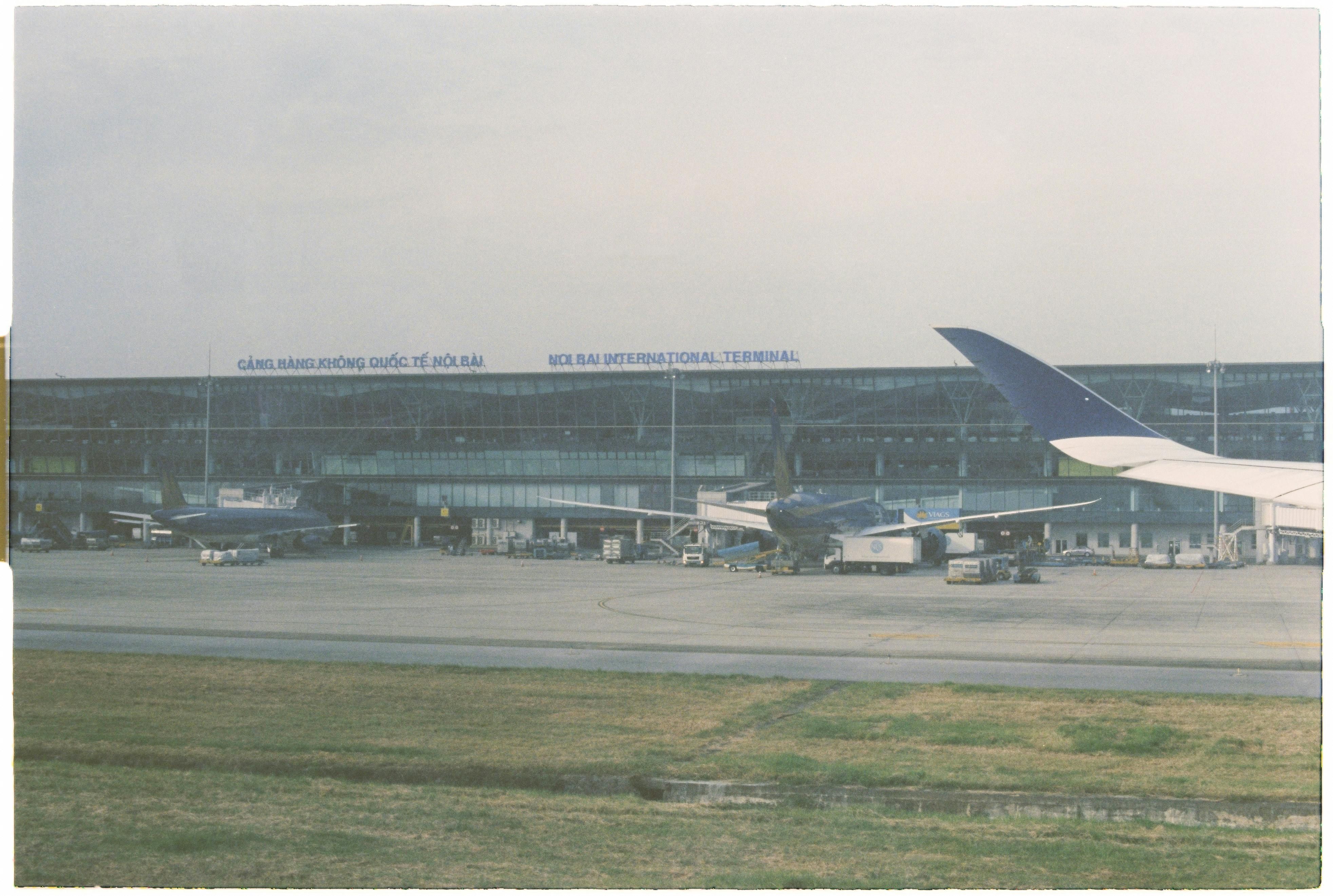 Vietnam — Airplanes on the tarmac at Noi Bai International Airport in Hanoi, Vietnam.